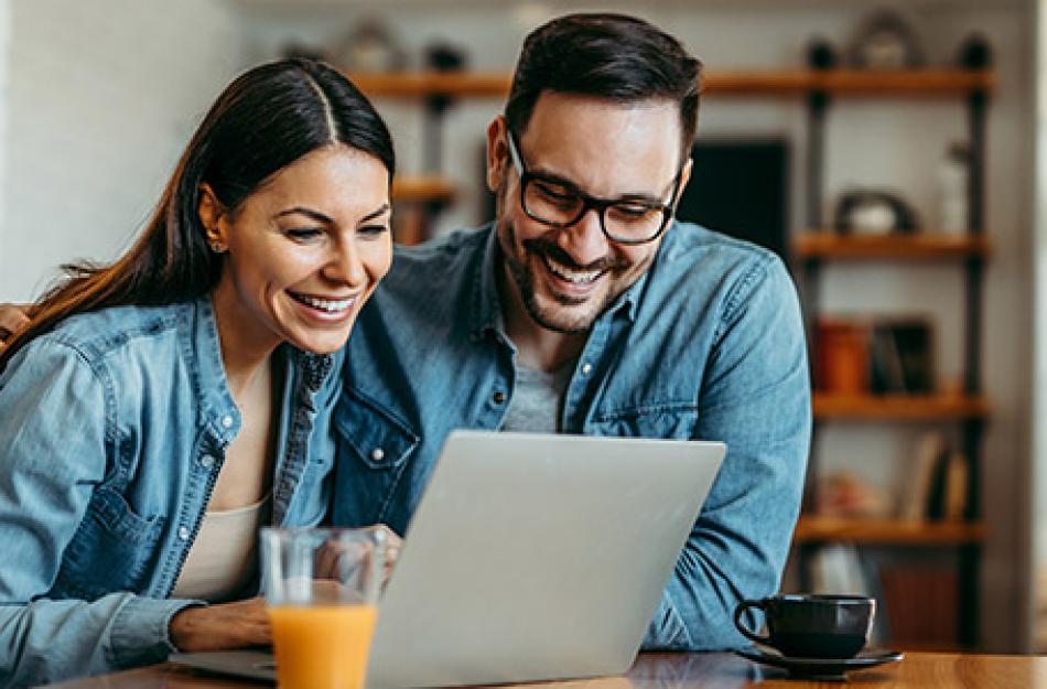 couple working on a laptop computer