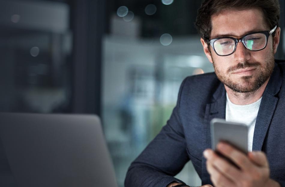 man looking at his phone