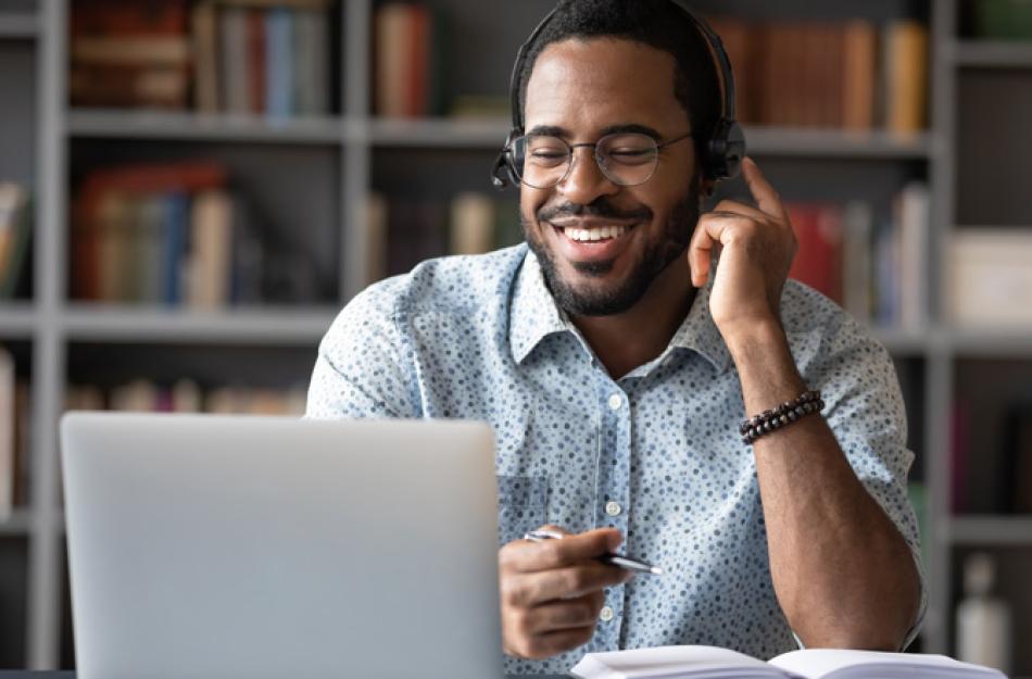 man listening to headphones