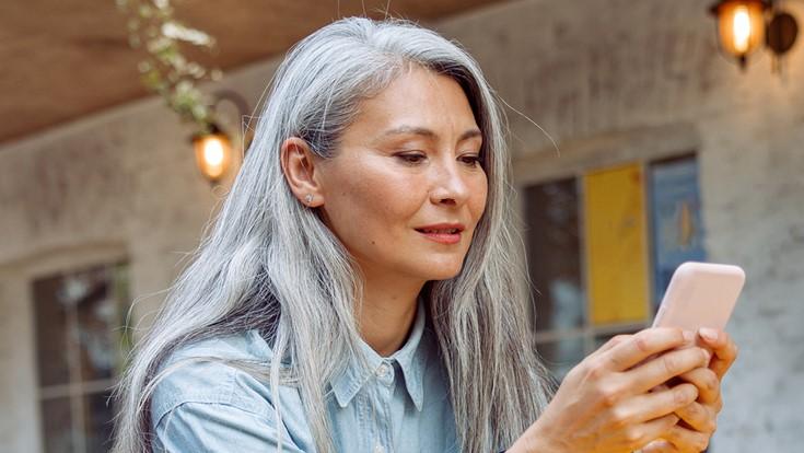 woman looking at her phone